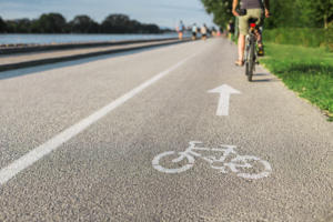 Bicycle lane mark on the city cycle lane in summertime.
